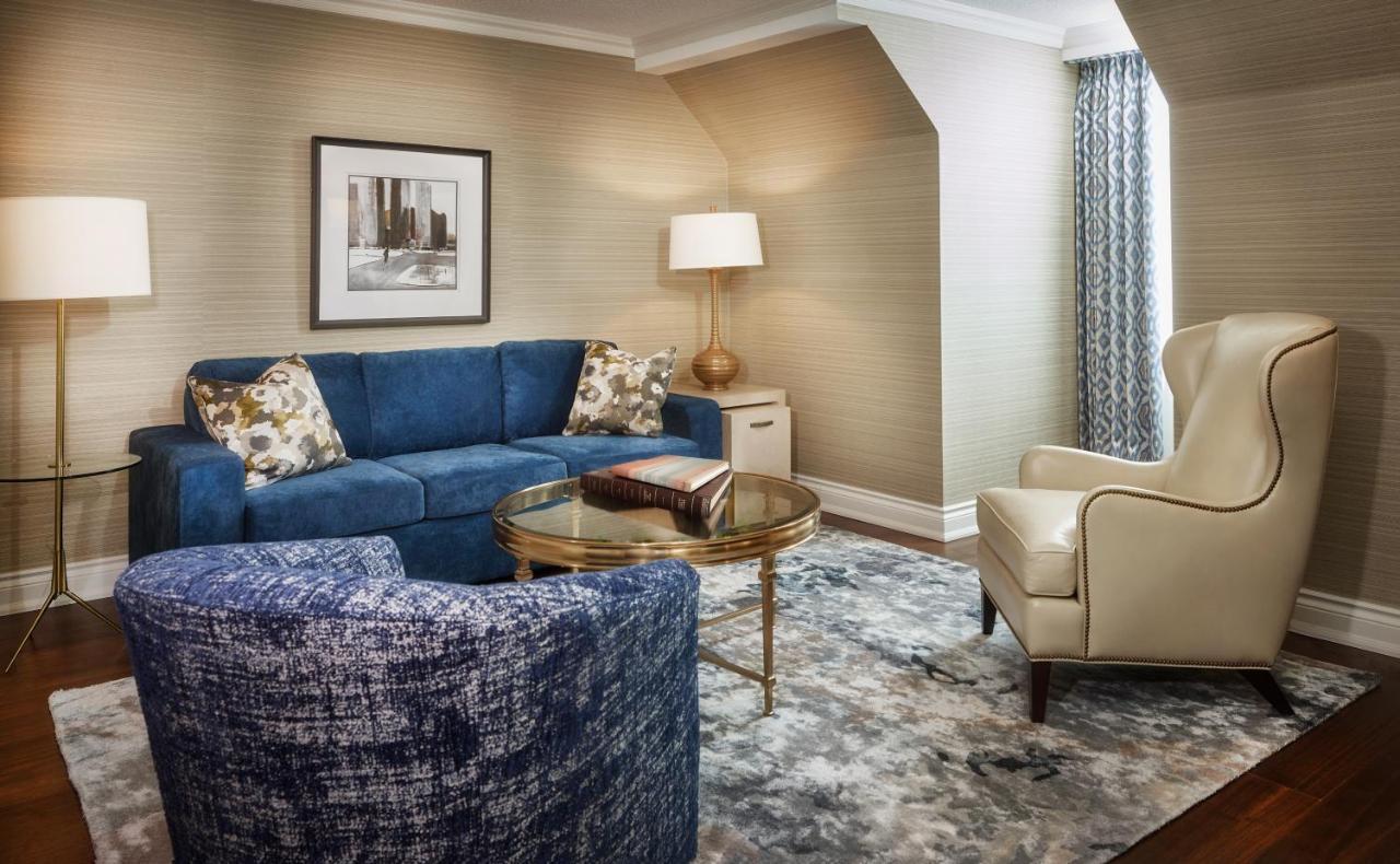Chateau Vaudreuil Exterior foto A living room at the Ritz-Carlton, Boston