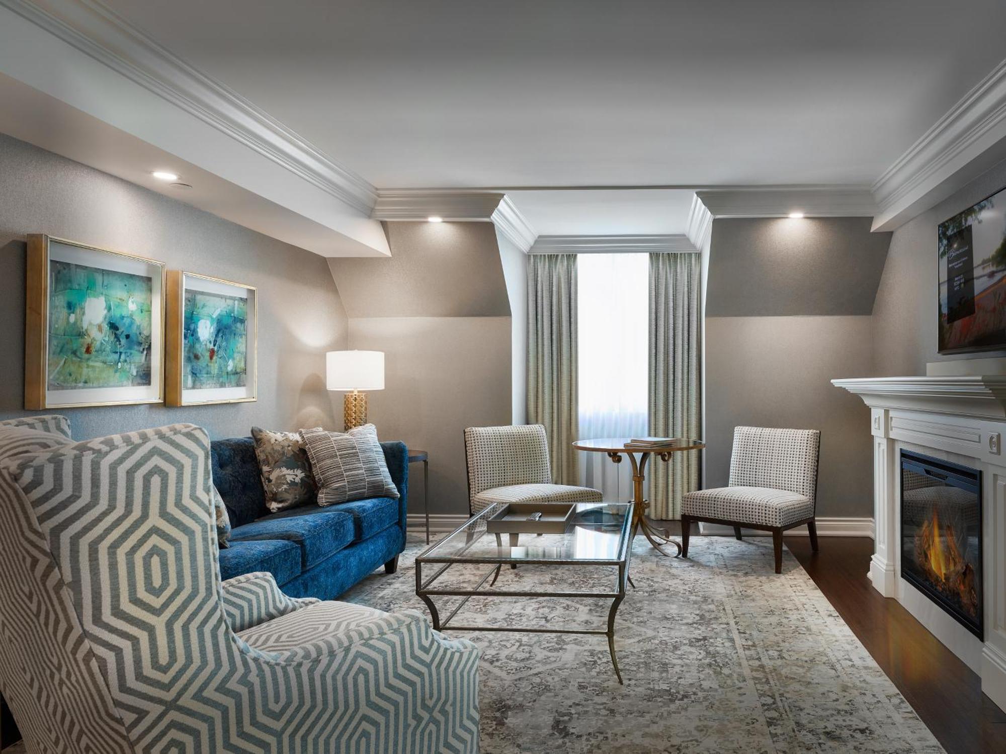 Chateau Vaudreuil Exterior foto A living room at the hotel