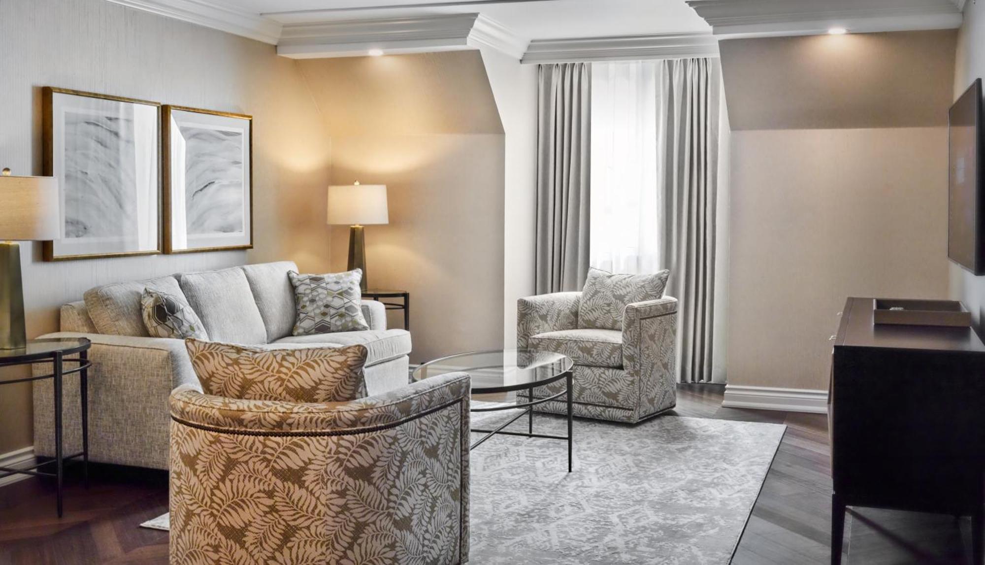 Chateau Vaudreuil Exterior foto A living room at the Ritz-Carlton, Boston